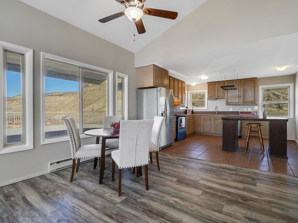 653 39 Road Palisade, CO 81526 - Photo 13 of 35 a dining room with furniture and window
