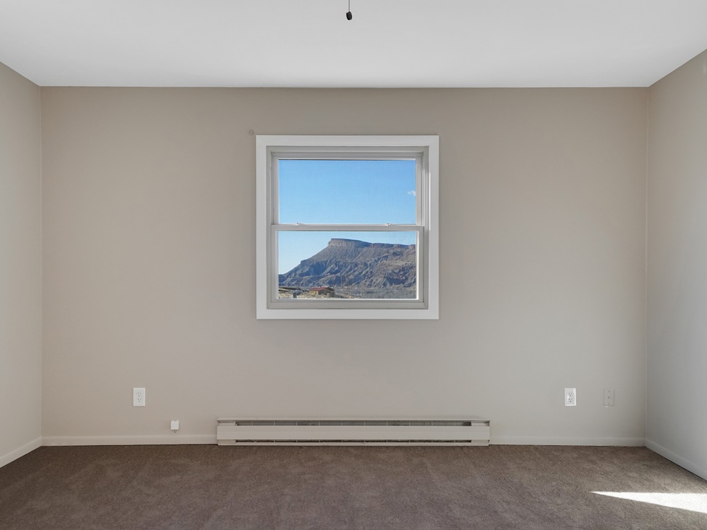 653 39 Road Palisade, CO 81526 - Photo 18 of 35 an empty room with a window