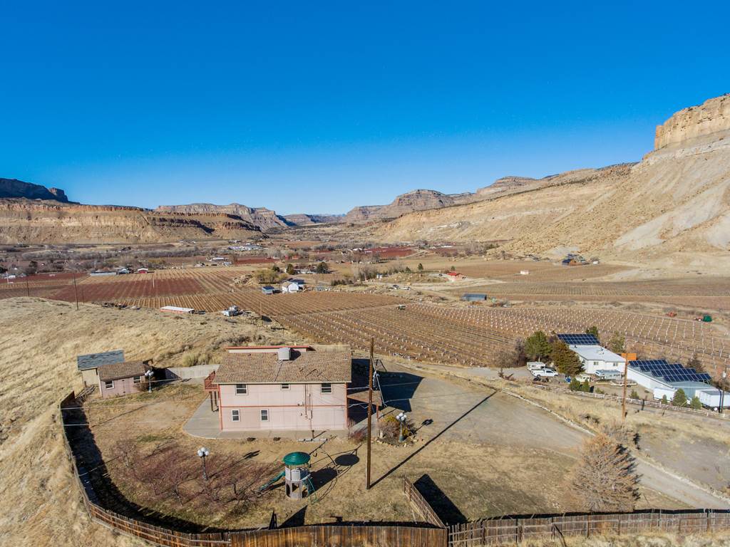 653 39 Road Palisade, CO 81526 - Photo 2 of 35 a view of a ocean view