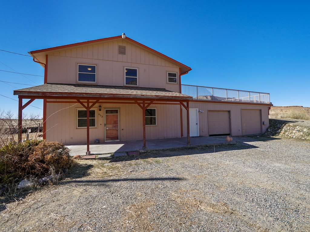 653 39 Road Palisade, CO 81526 - Photo 28 of 35 a front view of a house with a yard