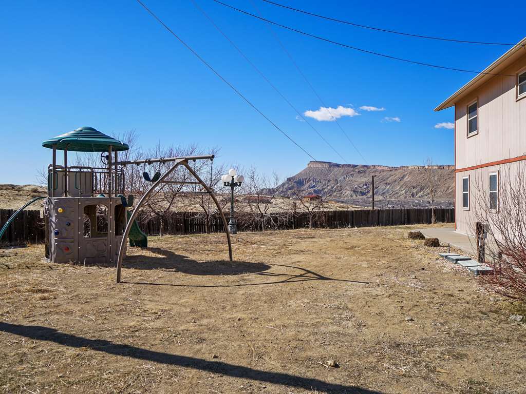 653 39 Road Palisade, CO 81526 - Photo 30 of 35 a view of a slide