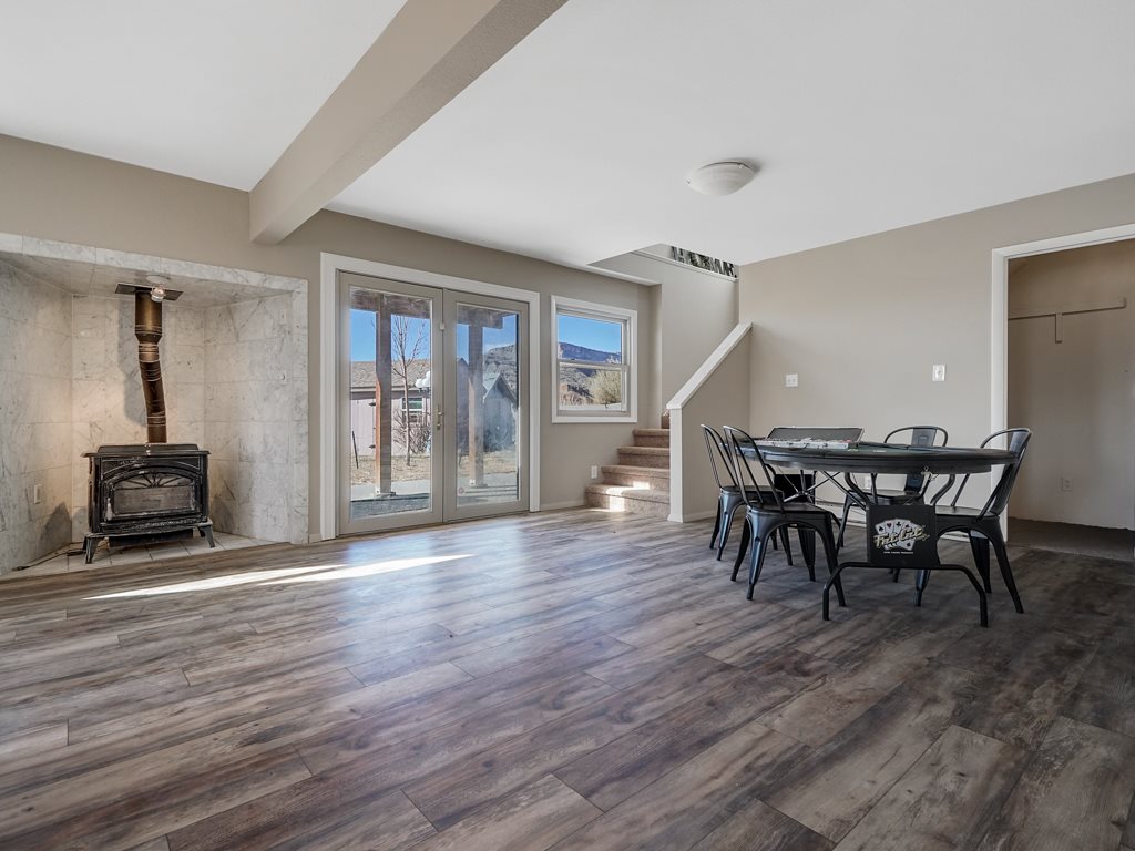 653 39 Road Palisade, CO 81526 - Photo 7 of 35 a dining room with furniture and wooden floor