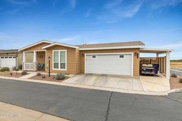 a front view of a house with a garage