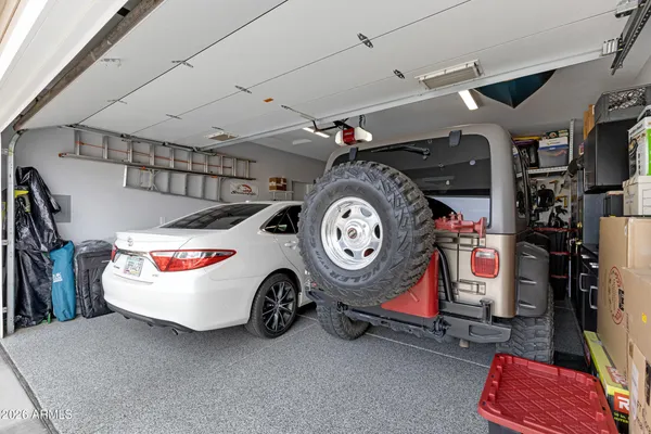 a view of backyard with a chair and dining table