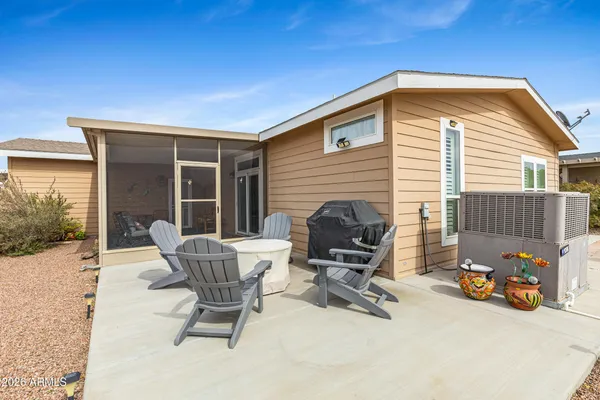 a view of a terrace with chairs