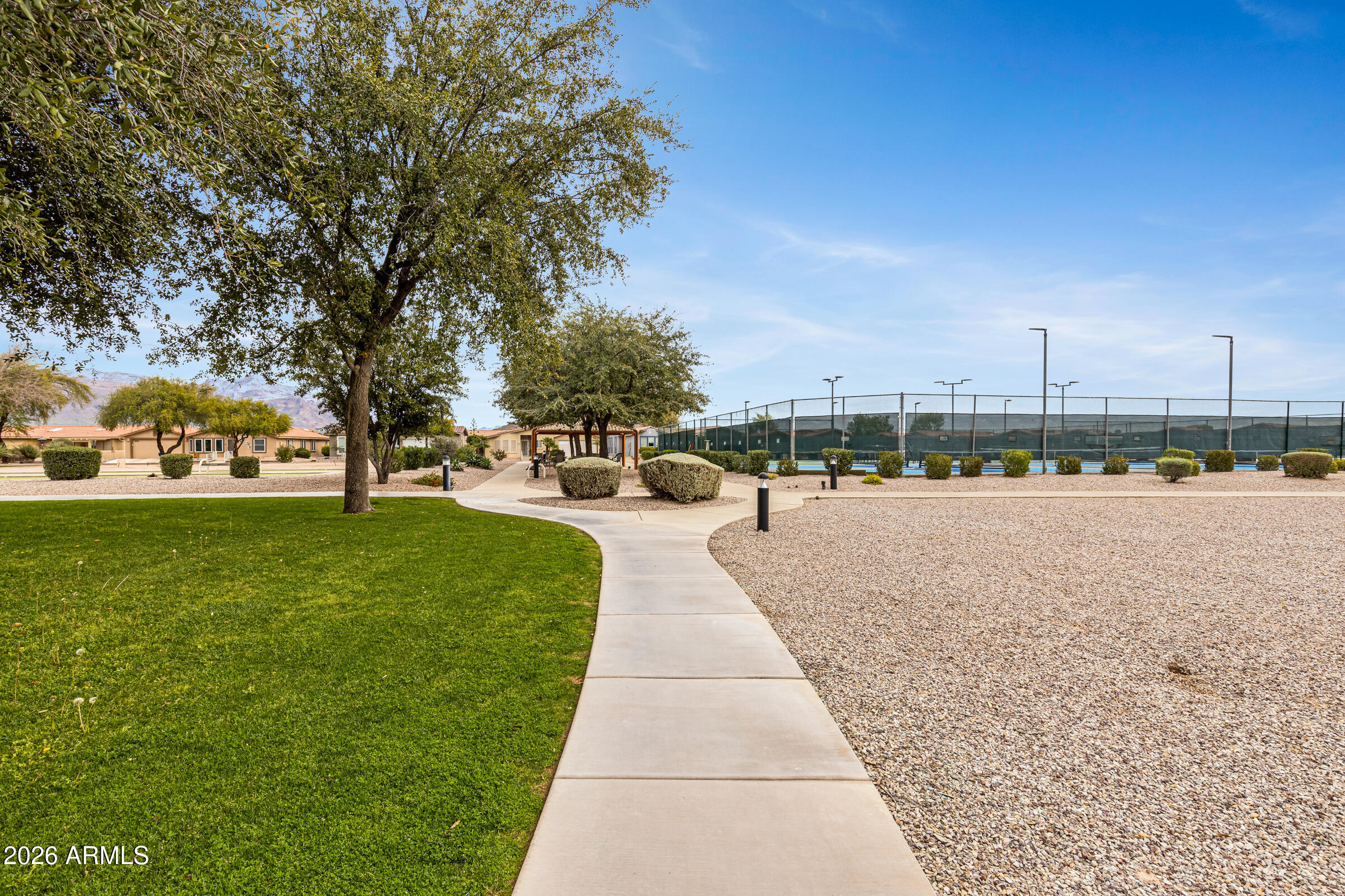 3301 South Goldfield Road, Unit 6055 Apache Junction, AZ 85119 - Photo 38 of 49 a park view with large trees