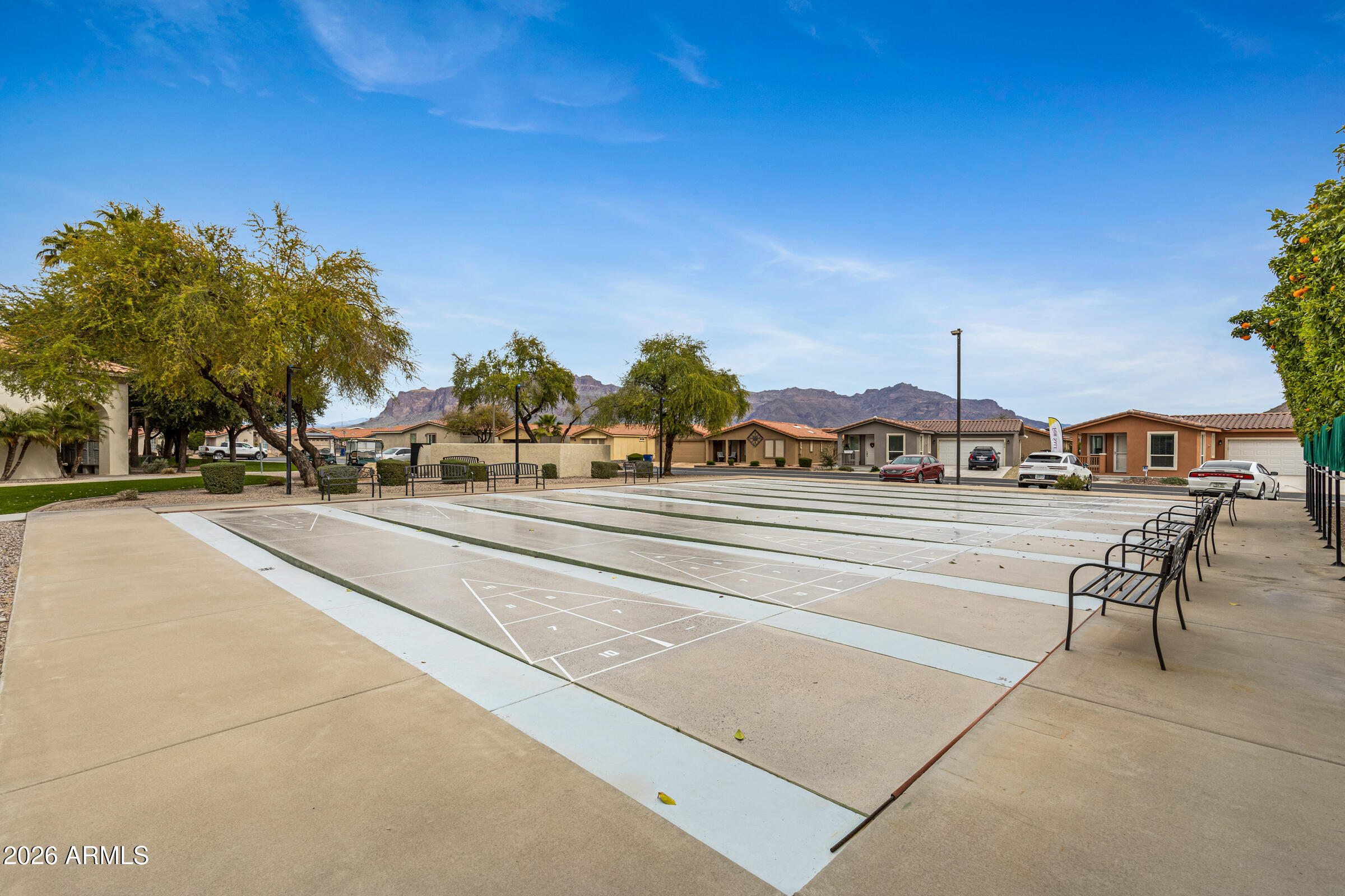 3301 South Goldfield Road, Unit 6055 Apache Junction, AZ 85119 - Photo 45 of 49 a view of building with cars parked