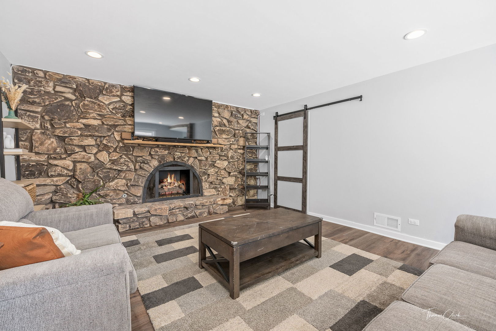 418 Kipling Court Wheaton, IL 60187 - Photo 17 of 47 a living room with a couch and a fireplace