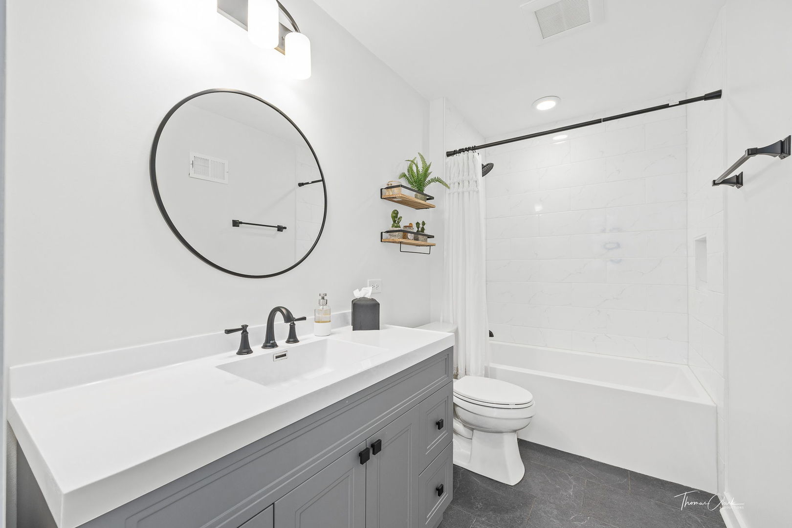418 Kipling Court Wheaton, IL 60187 - Photo 22 of 47 a bathroom with a sink a toilet and a mirror