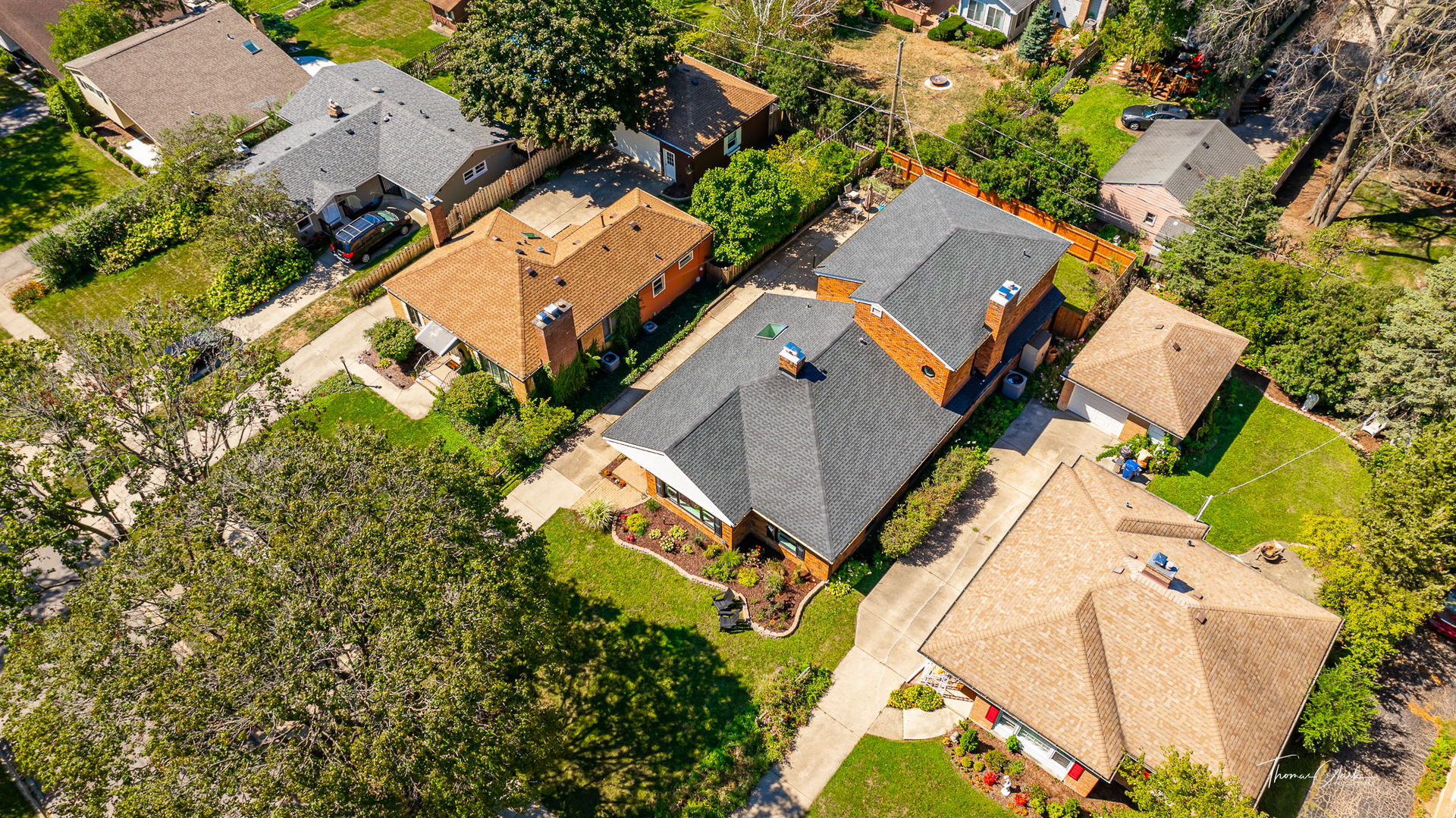 418 Kipling Court Wheaton, IL 60187 - Photo 38 of 47 an aerial view of a house with a yard and swimming pool