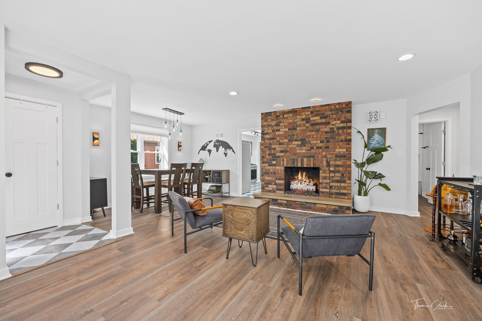 418 Kipling Court Wheaton, IL 60187 - Photo 6 of 47 a living room with furniture a fireplace and a table