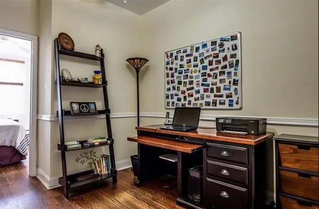 a view of workspace with wooden floor