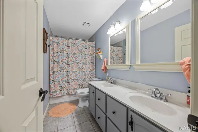 $650,000 | 391 Woodmere Drive, St. Charles, MO 63303