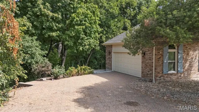 $650,000 | 391 Woodmere Drive, St. Charles, MO 63303