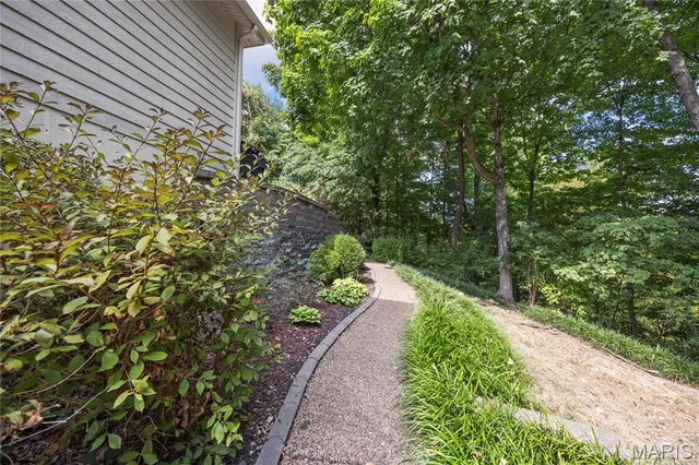 $650,000 | 391 Woodmere Drive, St. Charles, MO 63303