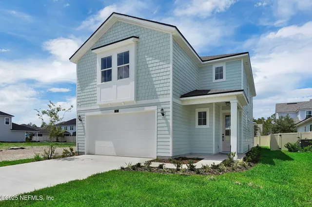 a front view of house with yard