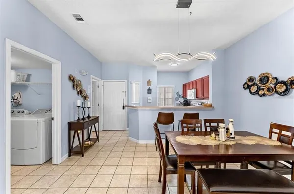 a view of a dining room with furniture