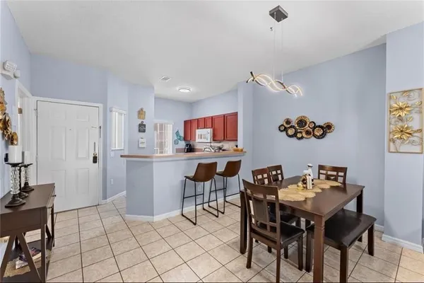 a view of a dining room with furniture