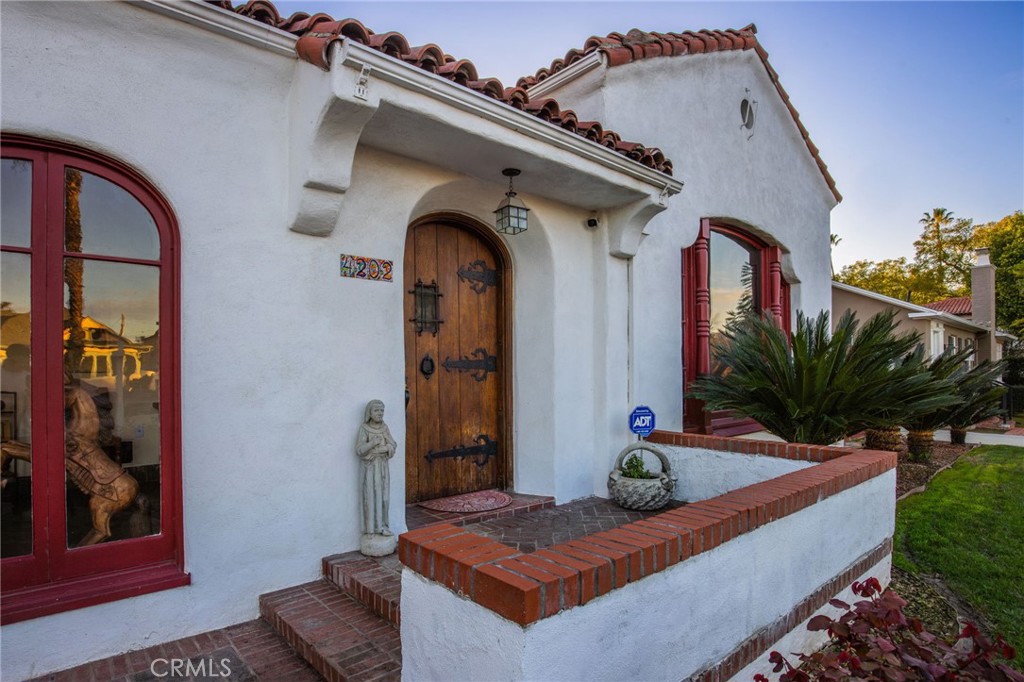 4202 University Riverside, CA 92501 - Photo 11 of 53 a front view of a house with garden