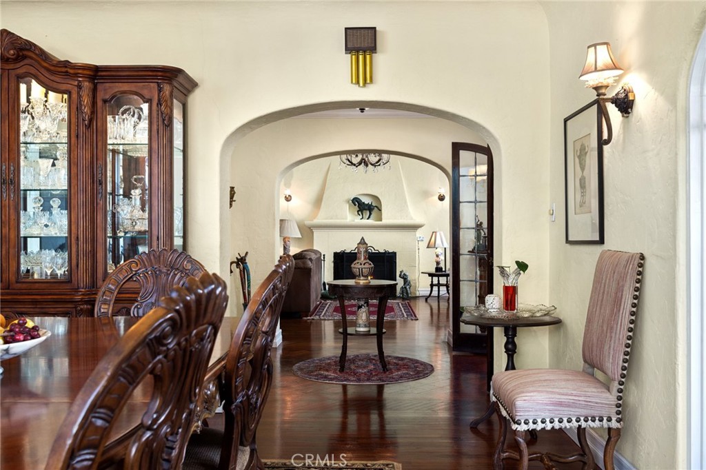 4202 University Riverside, CA 92501 - Photo 17 of 53 a living room with furniture a fireplace and a chandelier
