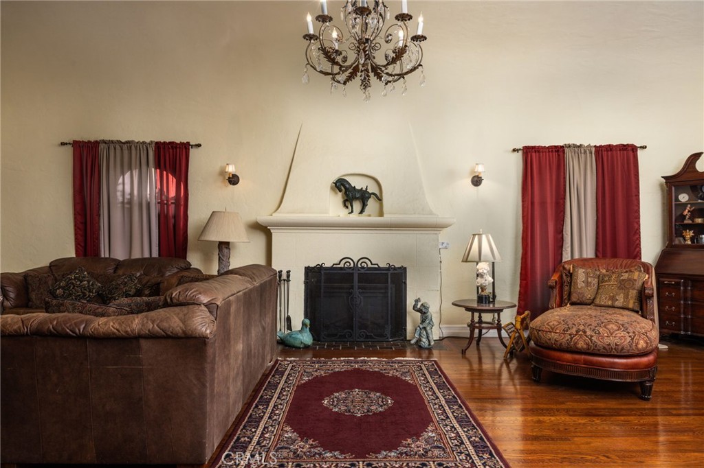 4202 University Riverside, CA 92501 - Photo 22 of 53 a living room with furniture and a fireplace
