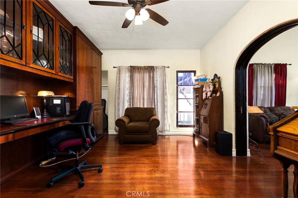 4202 University Riverside, CA 92501 - Photo 25 of 53 a living room with furniture gym equipment and a large window
