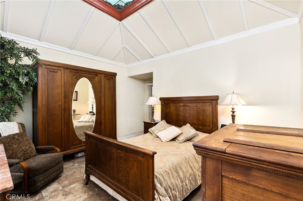 4202 University Riverside, CA 92501 - Photo 35 of 53 a bed room with a bed and a couch