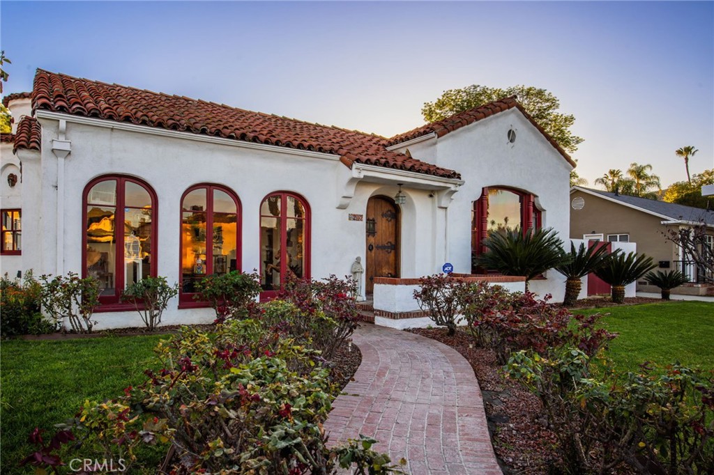 4202 University Riverside, CA 92501 - Photo 4 of 53 a front view of a house with a porch