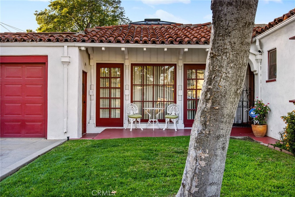 4202 University Riverside, CA 92501 - Photo 8 of 53 a front view of a house with porch and garden
