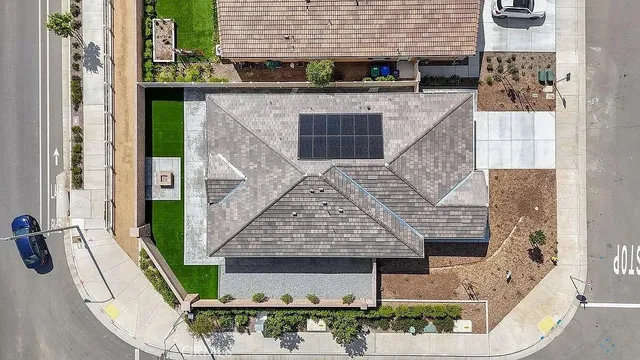 a front view of a house with outdoor area