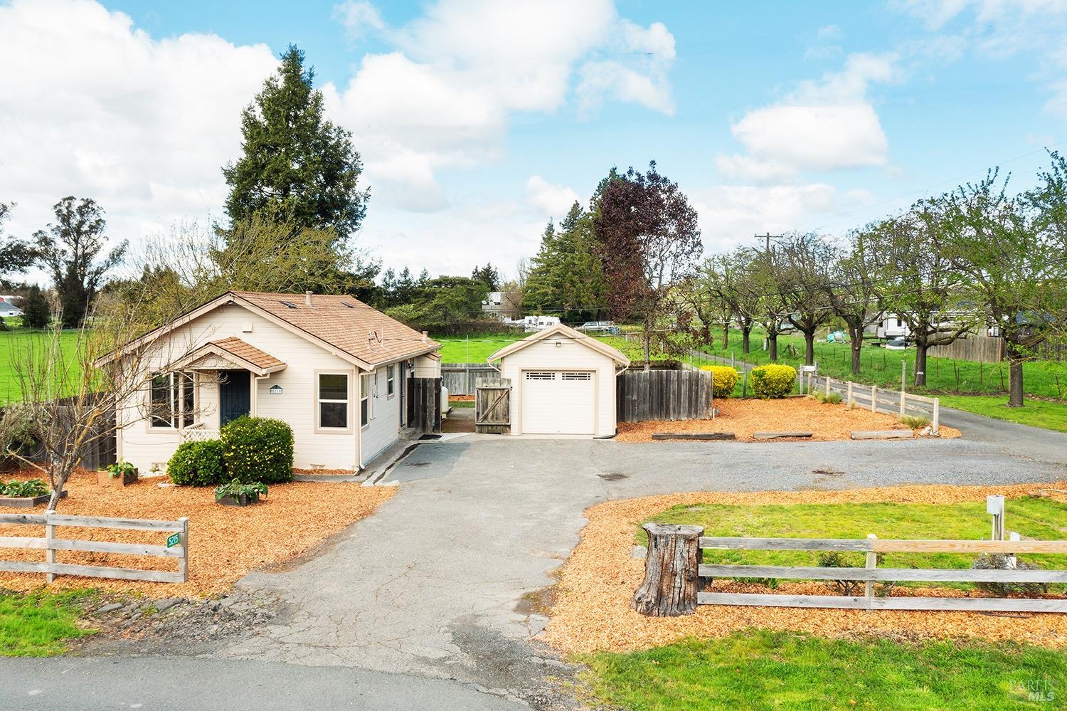 a house view with a garden space