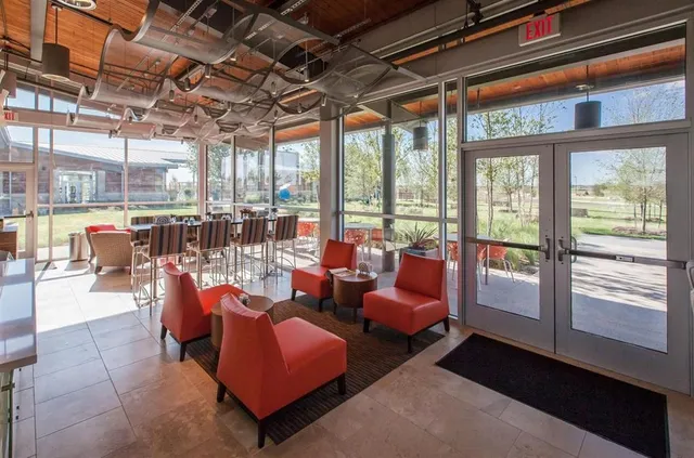 a view of a house with backyard