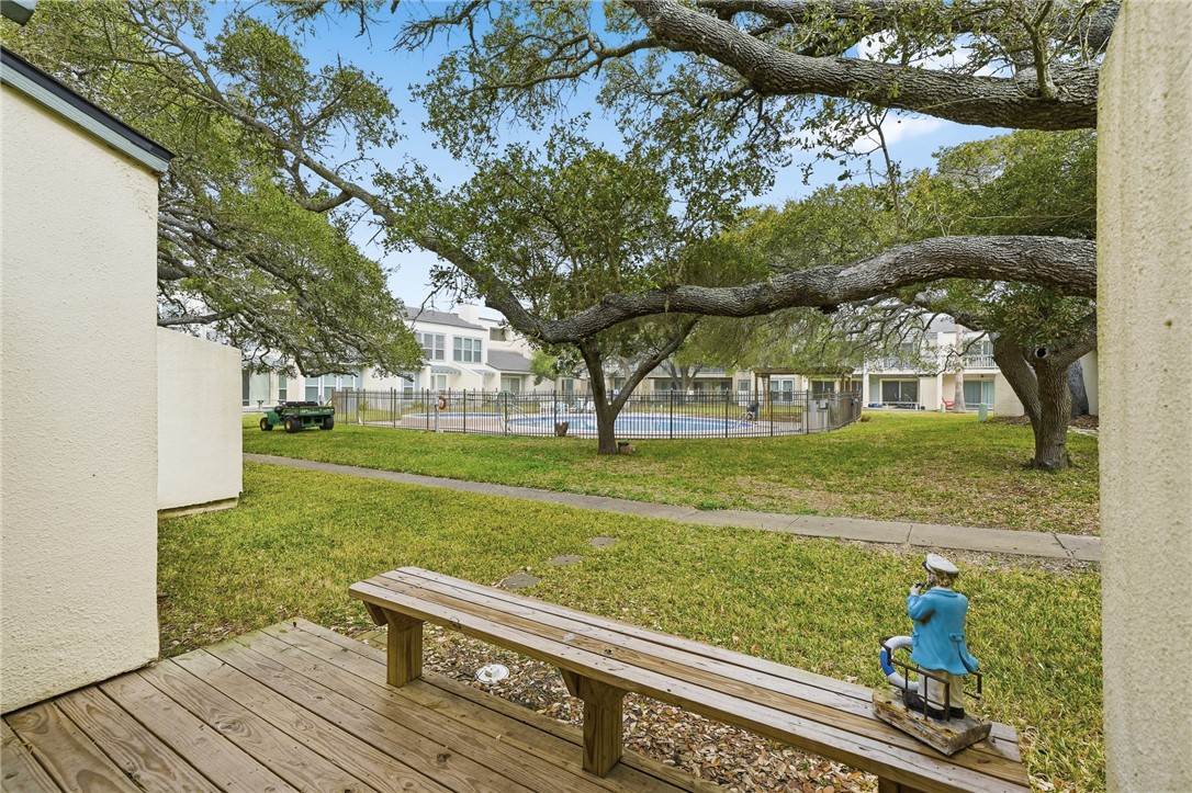 2003 North Fulton Beach Road, Unit 34 34 Rockport, TX 78382 - Photo 21 of 38 a view of a house with a yard