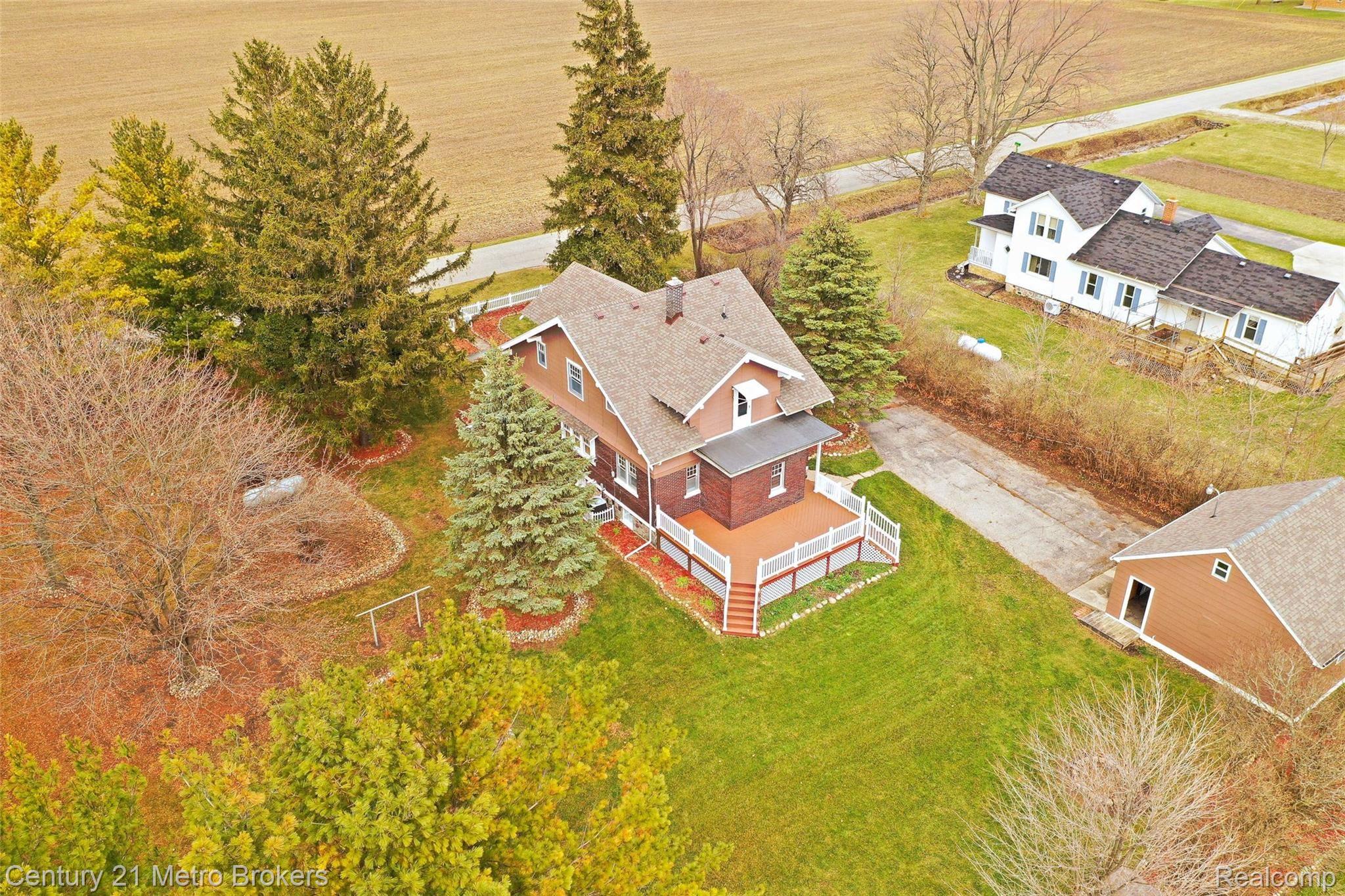 9025 Waterman Road Vassar, MI 48768 - Photo 38 of 49 9025-Waterman-Rd-Outside Back Side.jpg
