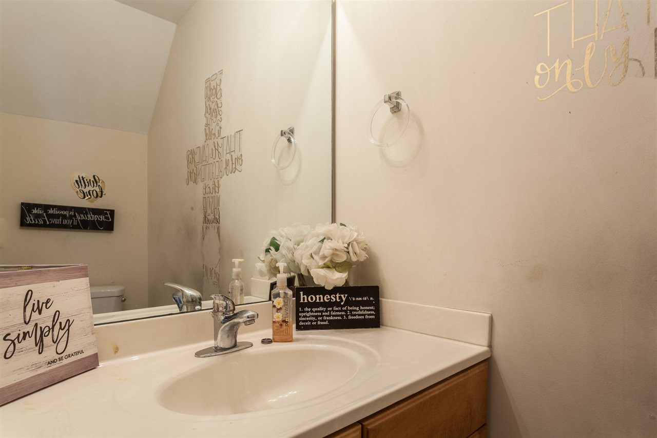 4000 Volkswalk Place Raleigh, NC 27610 - Photo 11 of 21 a bathroom with a sink and a mirror