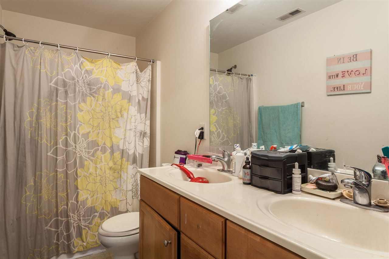 4000 Volkswalk Place Raleigh, NC 27610 - Photo 14 of 21 a bathroom with a sink and a mirror