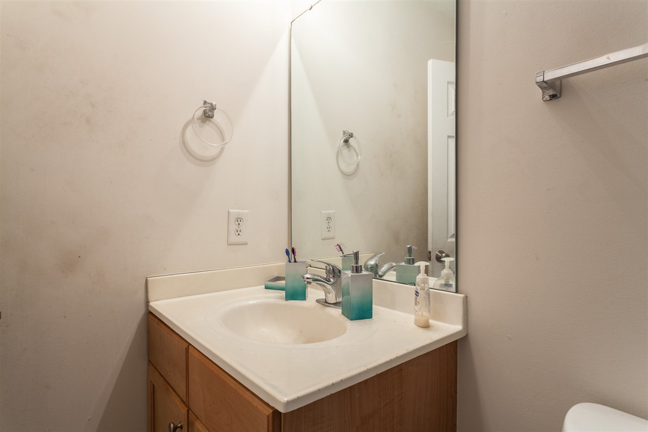 4000 Volkswalk Place Raleigh, NC 27610 - Photo 16 of 21 a bathroom with a sink and a mirror