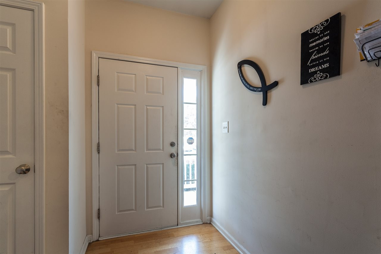 4000 Volkswalk Place Raleigh, NC 27610 - Photo 4 of 21 a view of a hallway with wooden floor
