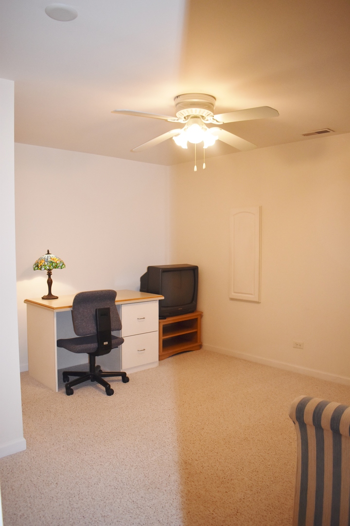 309 Ridge Road North Aurora, IL 60542 - Photo 14 of 16 a view of workspace with furniture