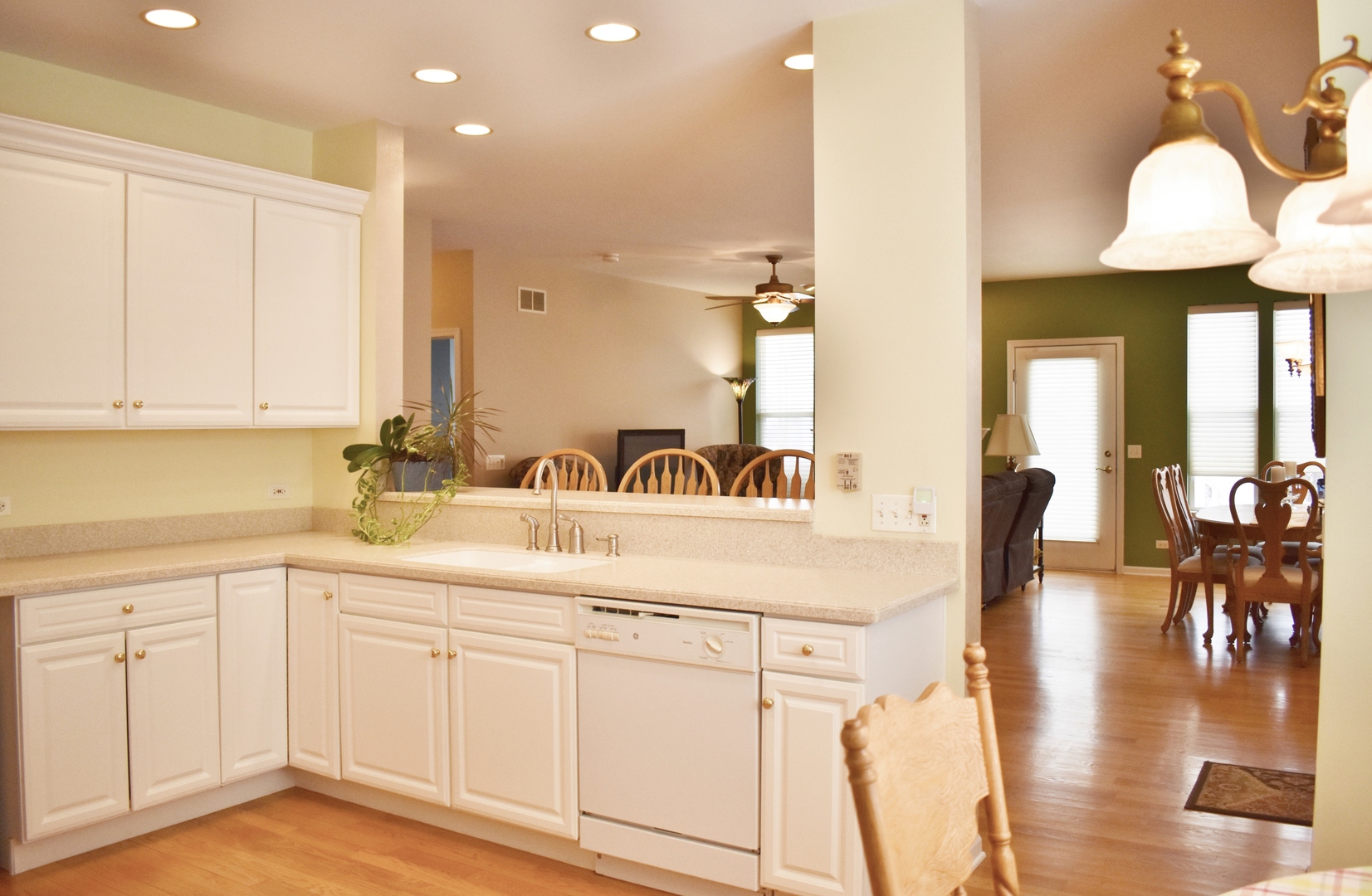 309 Ridge Road North Aurora, IL 60542 - Photo 5 of 16 a view of a kitchen with kitchen island a sink stainless steel appliances and cabinets