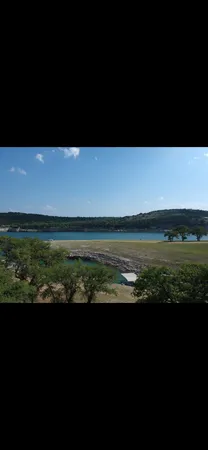 a view of road with trees