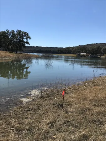 a view of a balcony with floor to ceiling window