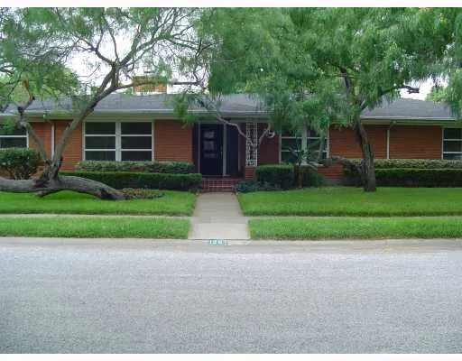 front view of a house and a yard