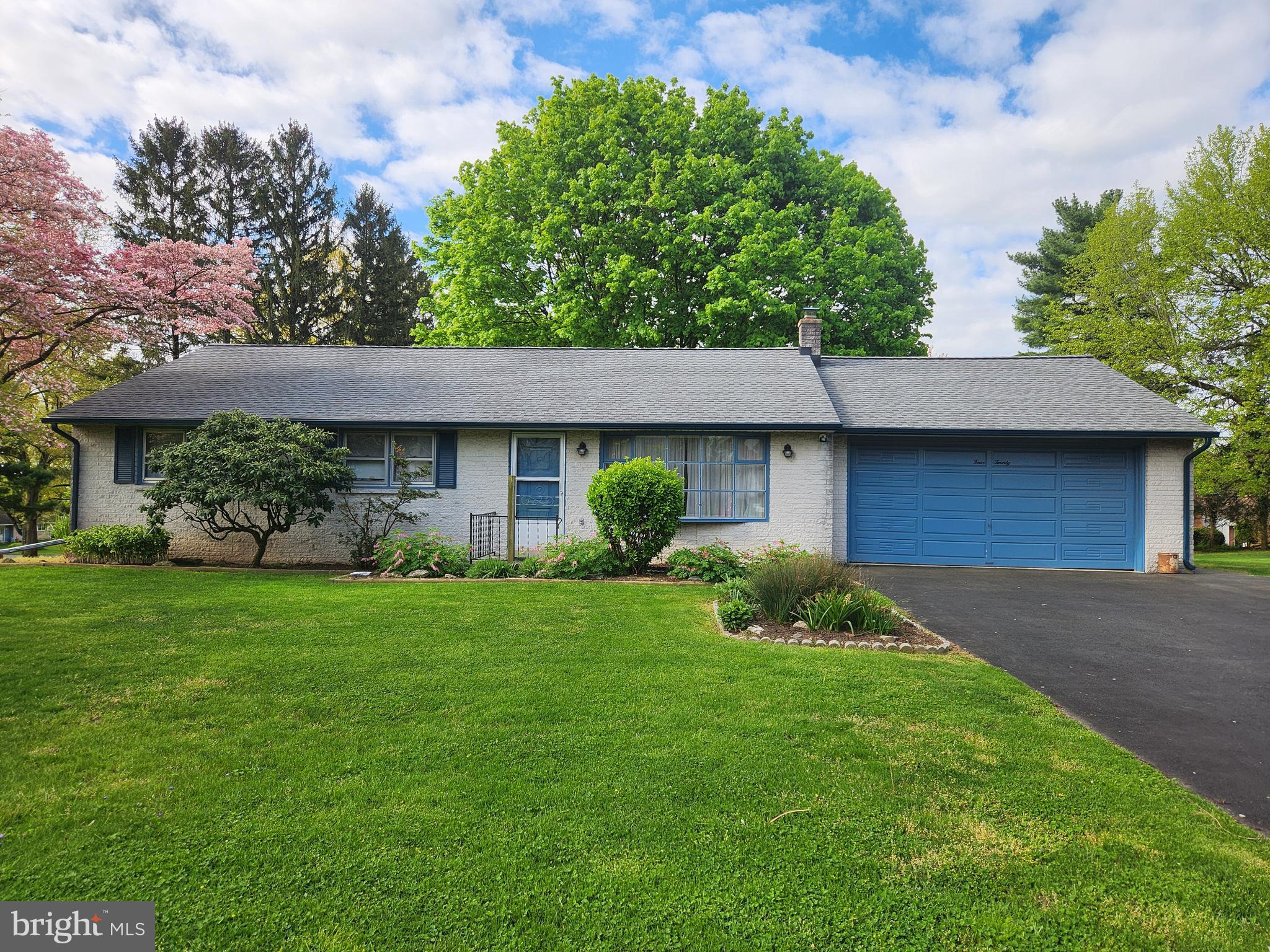 420 Owl Hill Road Lititz, PA 17543 - Photo 1 of 38 a front view of a house with a garden