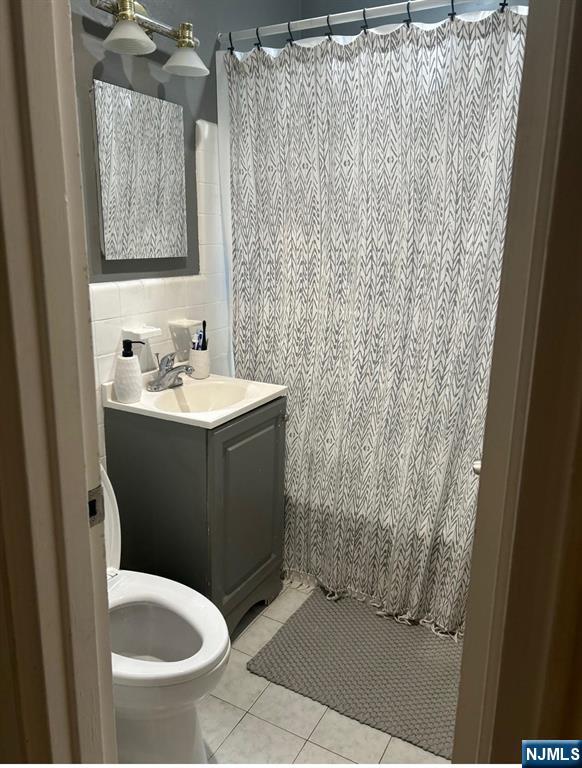 1480 Terrace, Unit 4 Teaneck, NJ 07666 - Photo 5 of 14 a bathroom with a sink and toilet
