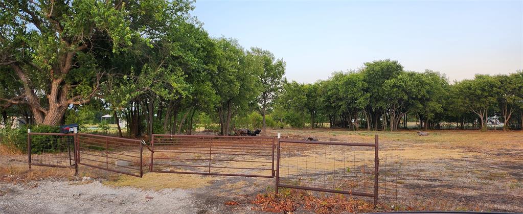 592 Pike Road Gunter, TX 75058 - Photo 34 of 40 View of yard with a gate, a rural view, and fence