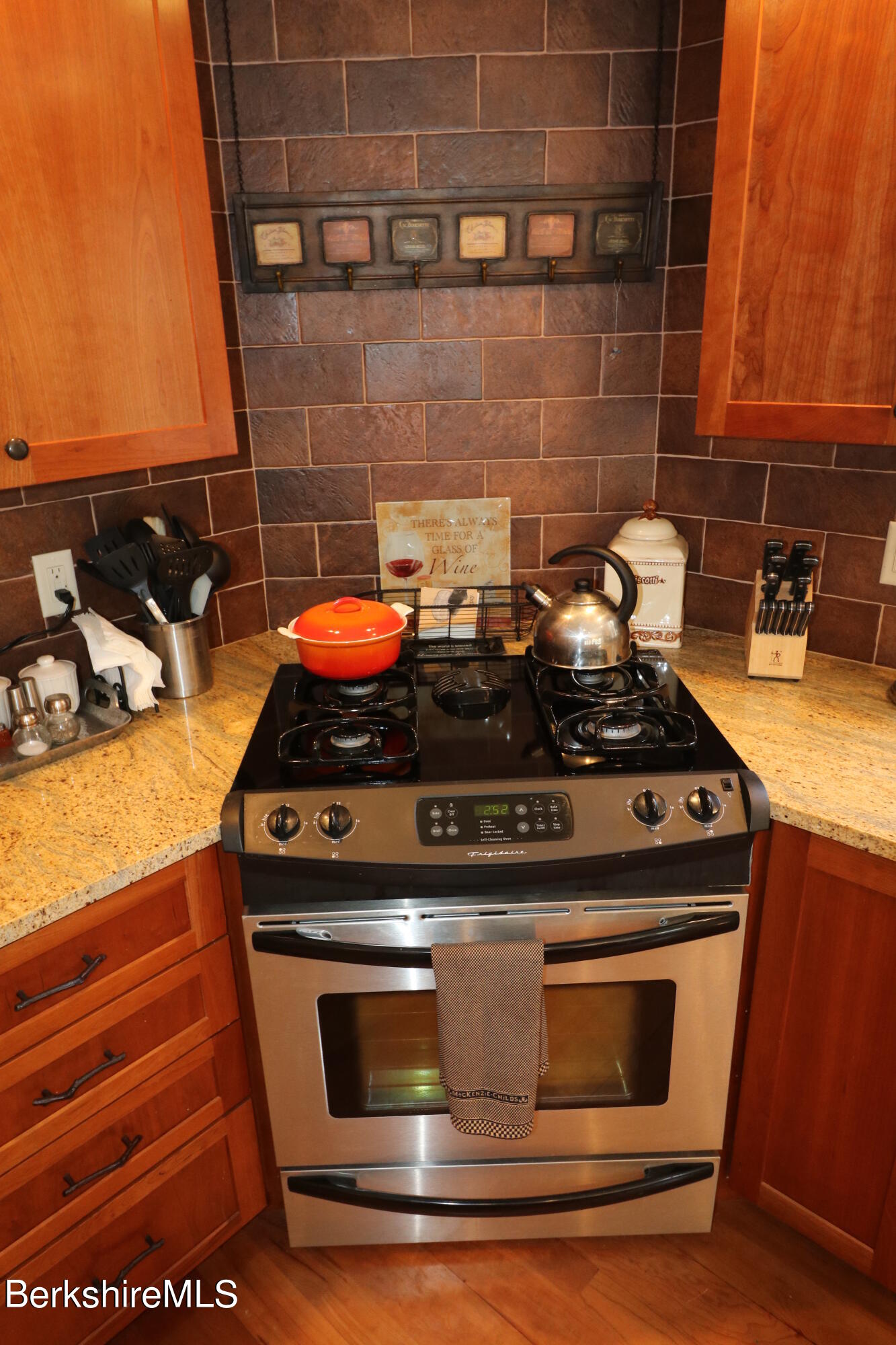 453 Ed Jones Road Otis, MA 01253 - Photo 14 of 41 a stove top oven sitting inside of a kitchen