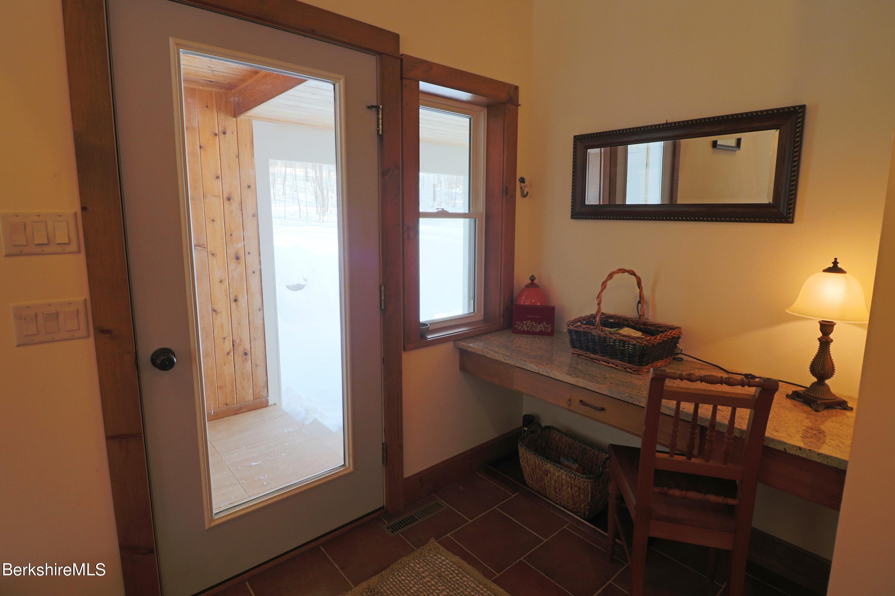 453 Ed Jones Road Otis, MA 01253 - Photo 6 of 41 a bathroom with a sink and a mirror