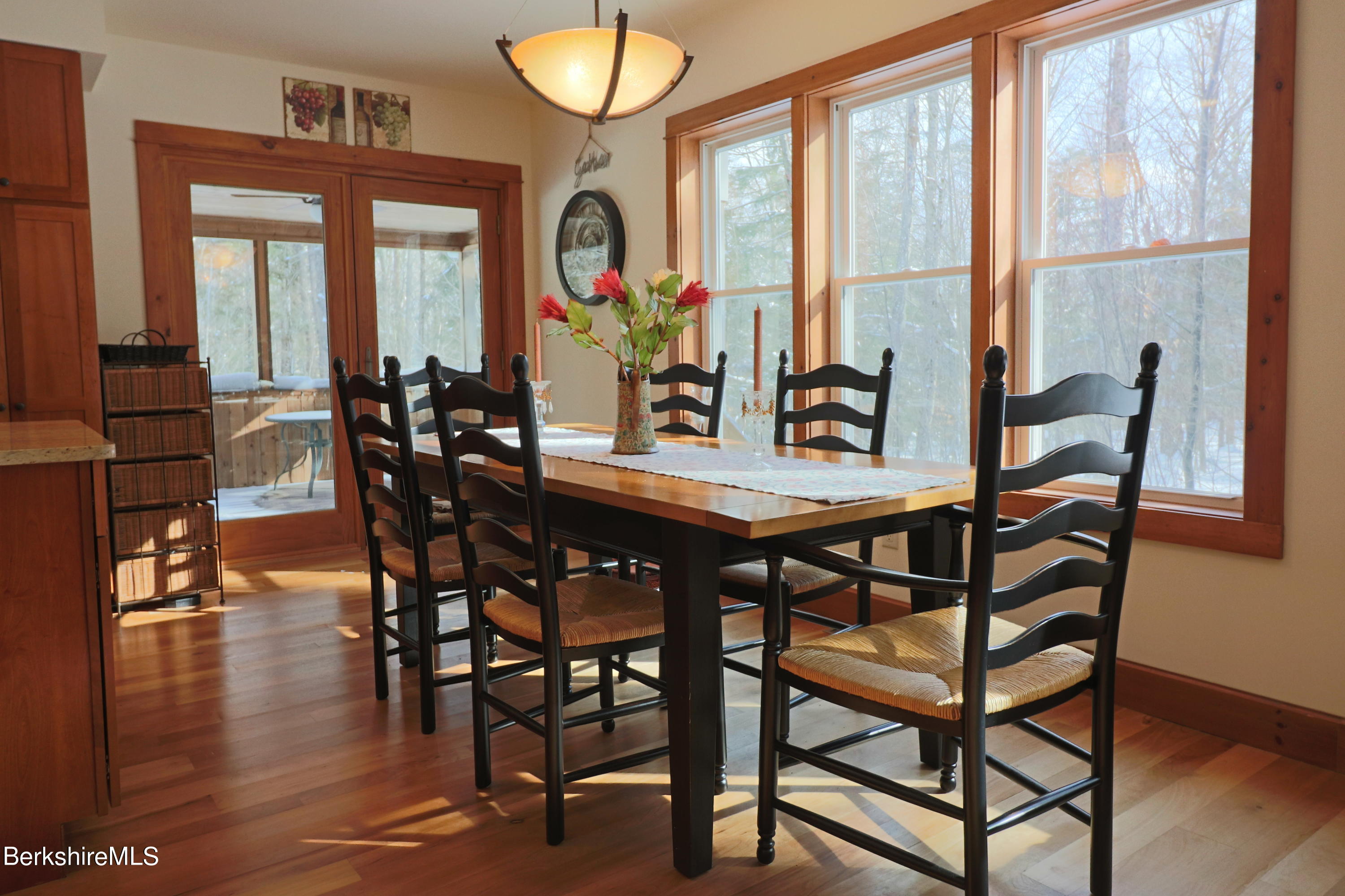 453 Ed Jones Road Otis, MA 01253 - Photo 9 of 41 a view of a dining room with furniture window and wooden floor