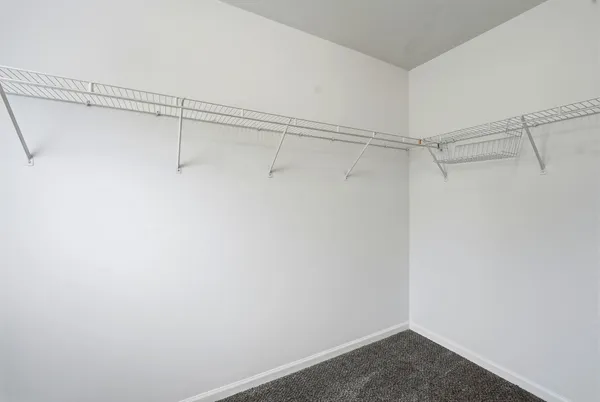 a view of a room with racks on the wall